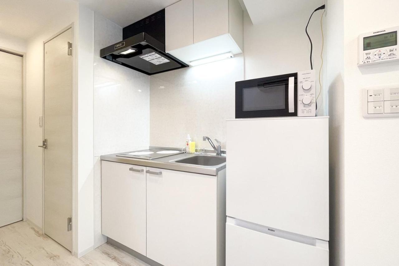 Apartamento Tasuki Smart Higashishinjuku Tokio Exterior foto